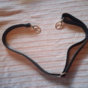 A Pocketbook Strap with Crabclaw End